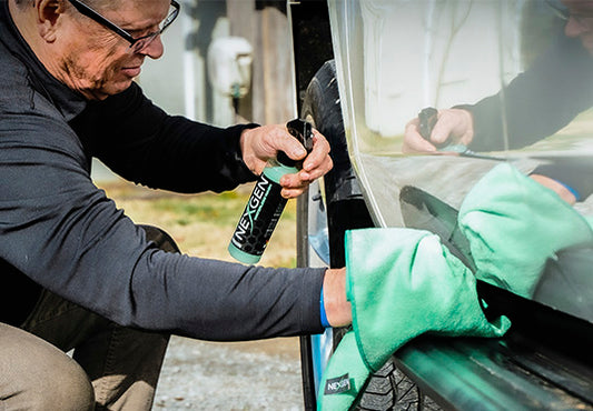 wiping with green towel and waterless wash